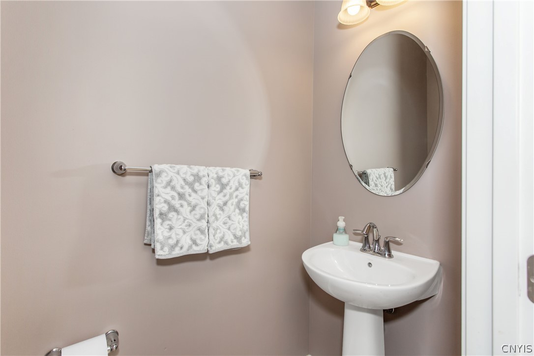 9 Naylor Circle Van Buren, NY 13027 - Photo 16 of 41 First Level: Half Bath with pedestal sink.