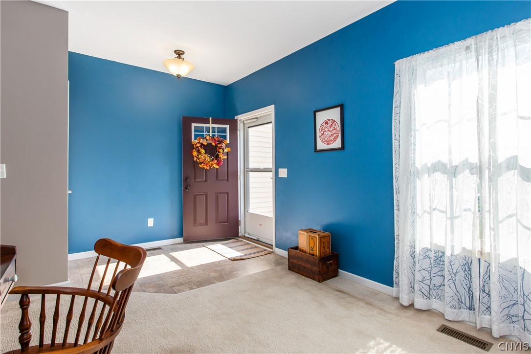 9 Naylor Circle Van Buren, NY 13027 - Photo 2 of 41 The inviting entryway with coat closet leads into