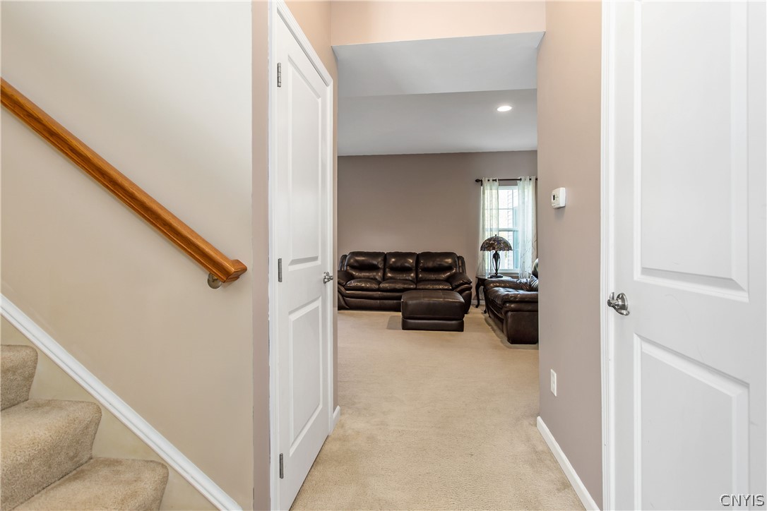 9 Naylor Circle Van Buren, NY 13027 - Photo 32 of 41 First Level: Basement door on the right.