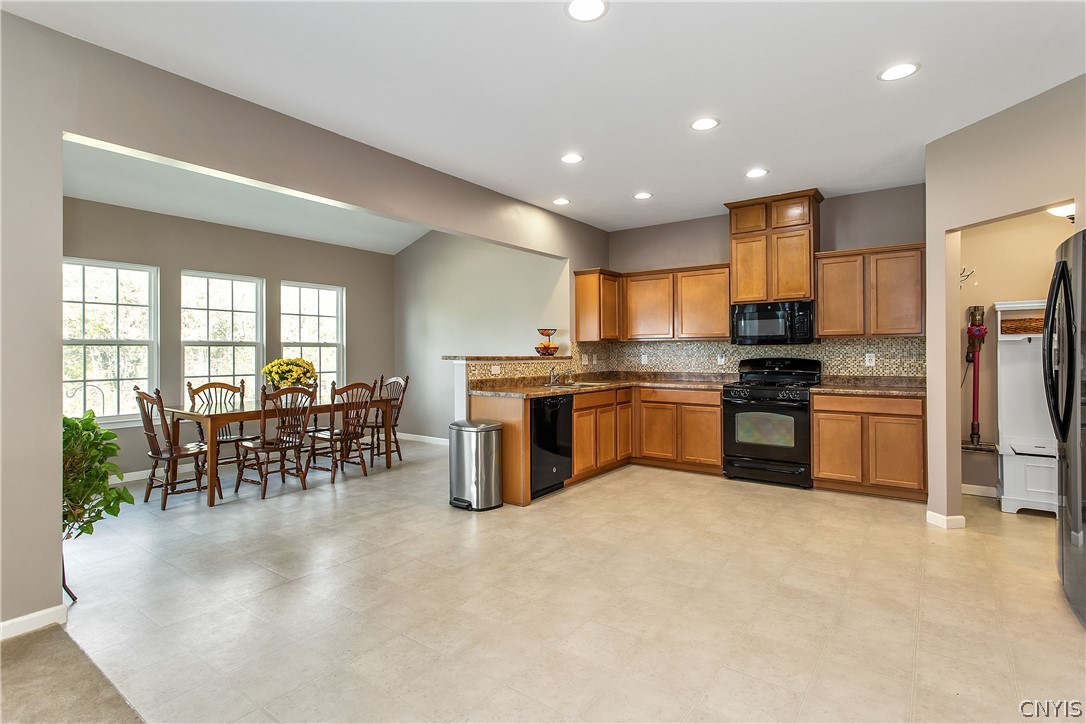 9 Naylor Circle Van Buren, NY 13027 - Photo 7 of 41 The kitchen area is LARGE and features maple cabin