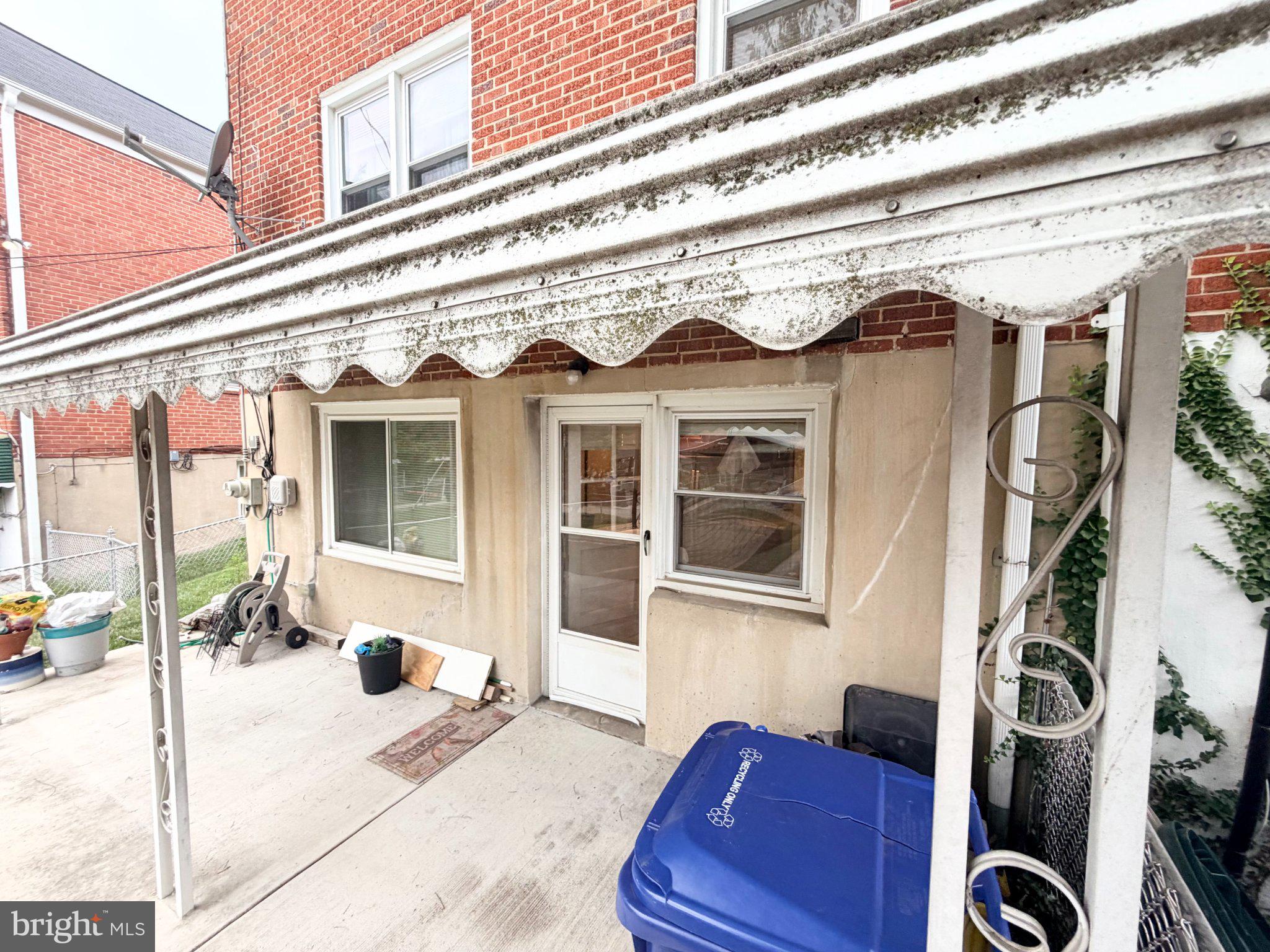 1615 Burnwood Road Baltimore, MD 21239 - Photo 66 of 83 Charming patio with vintage awning.
