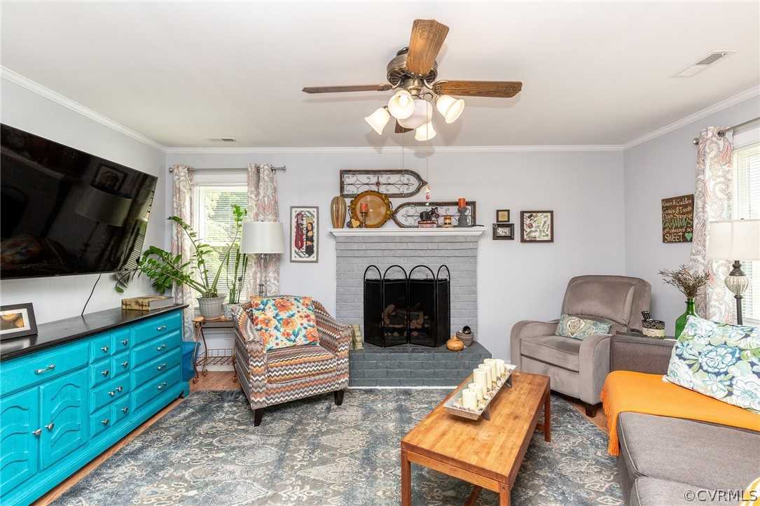 11231 Celtic Road Chesterfield, VA 23838 - Photo 15 of 26 a living room with furniture and a flat screen tv