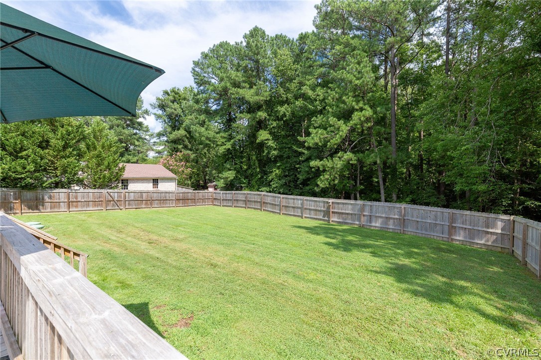 11231 Celtic Road Chesterfield, VA 23838 - Photo 24 of 26 a view of a backyard with a small pool