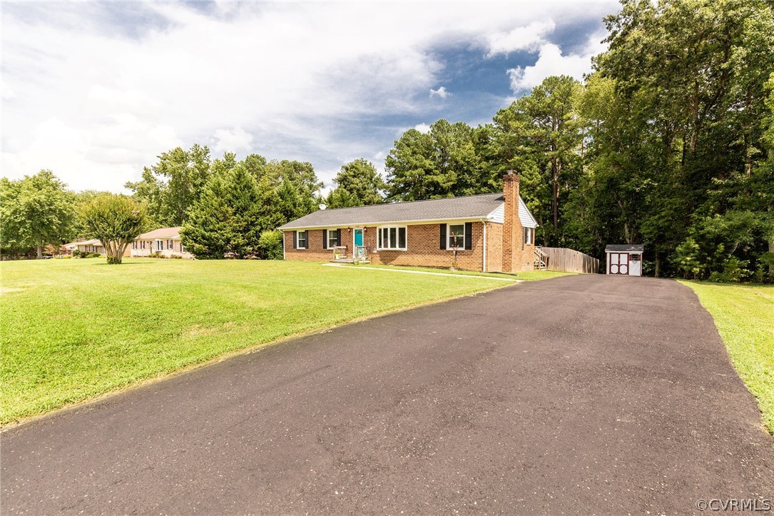11231 Celtic Road Chesterfield, VA 23838 - Photo 3 of 26 a view of an ocean with a big yard