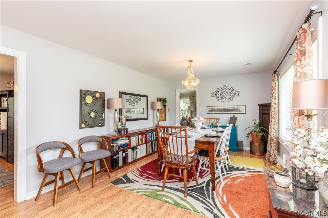 11231 Celtic Road Chesterfield, VA 23838 - Photo 5 of 26 a view of a dining room with furniture window and outside view