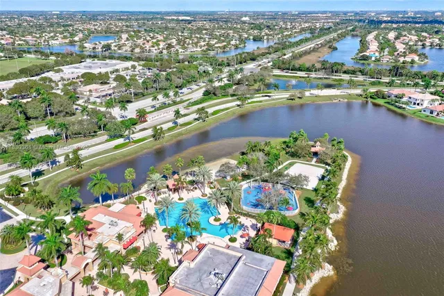 a view of a playground and swimming pool
