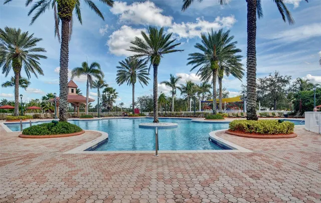 a view of a swimming pool with a patio