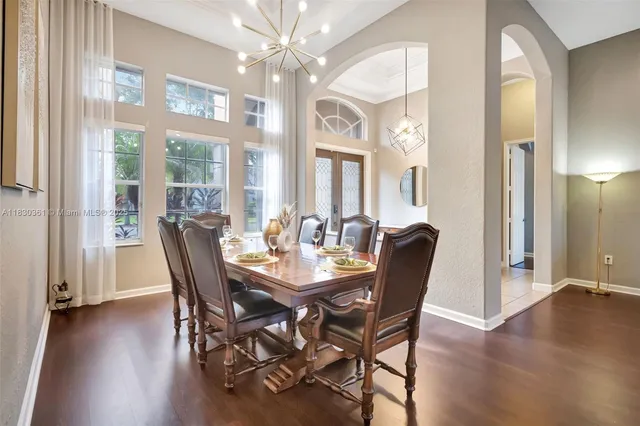 a view of a livingroom with furniture and wooden floor