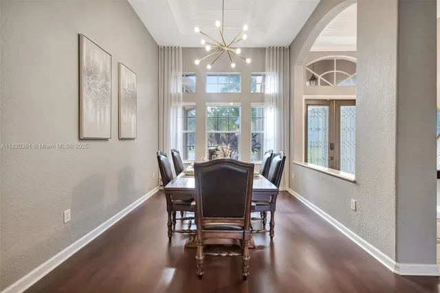 a view of workspace with wooden floor and seating space