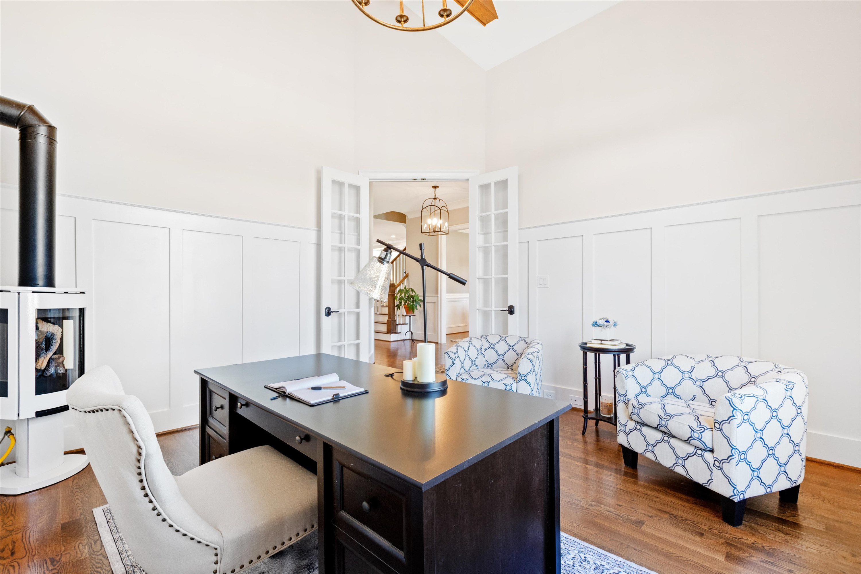 10340 Grafton Road Raleigh, NC 27615 - Photo 12 of 70 a view of a kitchen area with furniture and wooden floor