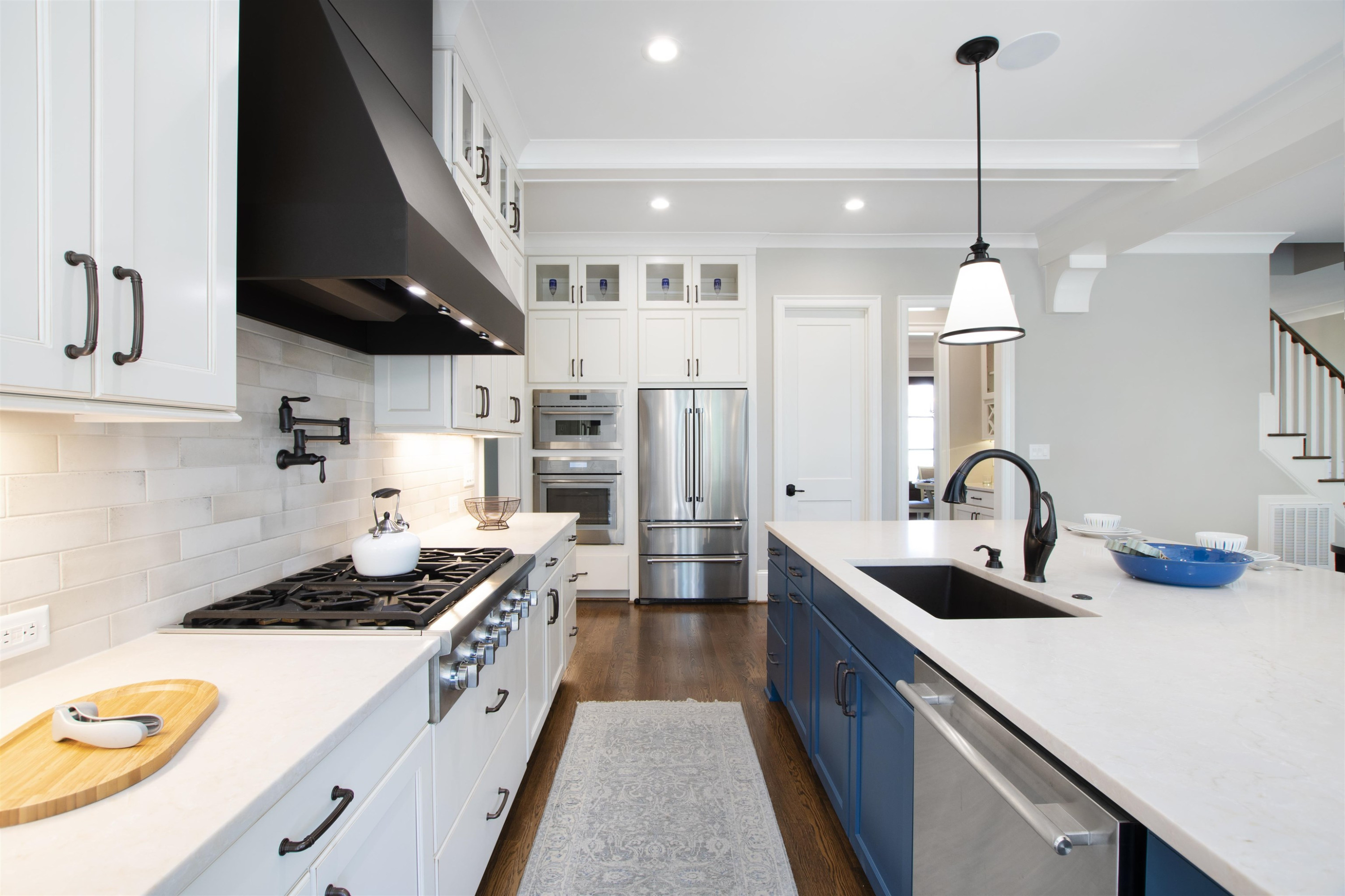 10340 Grafton Road Raleigh, NC 27615 - Photo 28 of 70 a kitchen with stainless steel appliances a sink stove and refrigerator