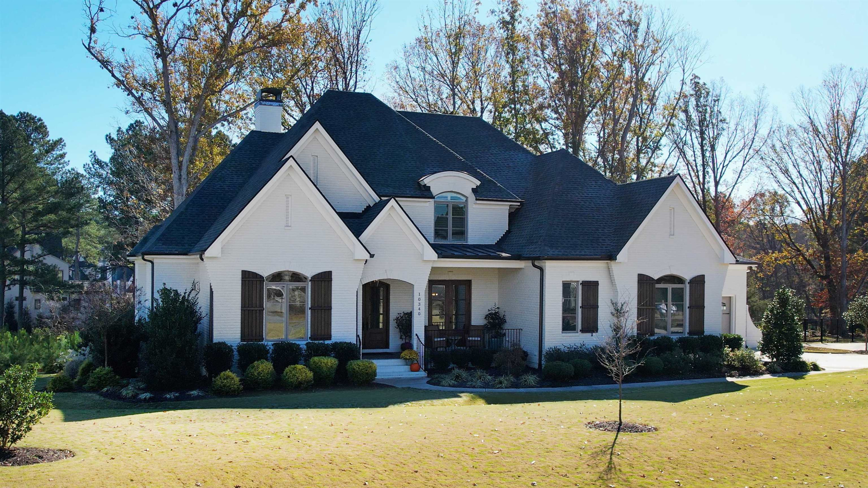 10340 Grafton Road Raleigh, NC 27615 - Photo 3 of 70 a front view of a house with a yard