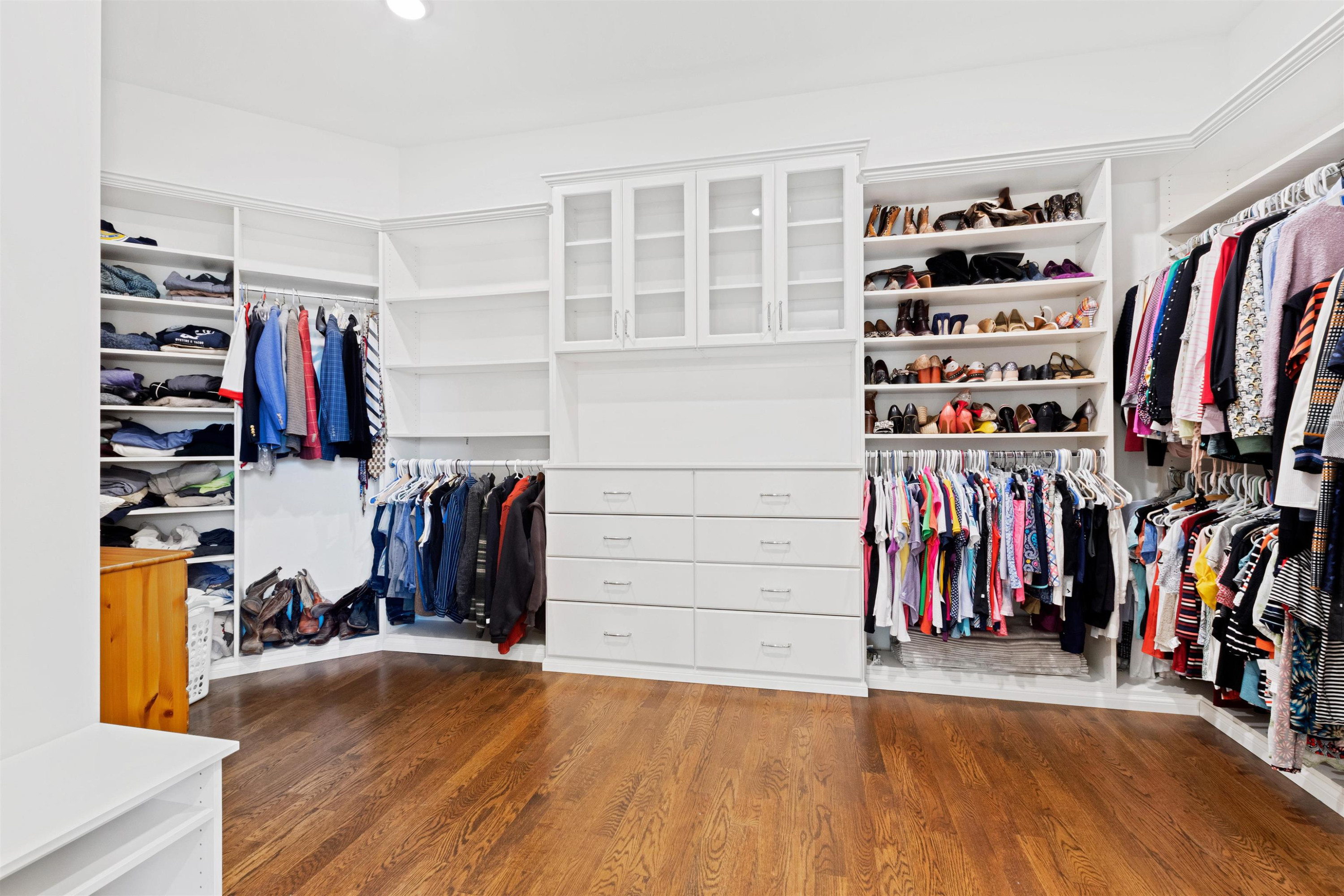 10340 Grafton Road Raleigh, NC 27615 - Photo 39 of 70 a view of walk in closet with clothes and shoes
