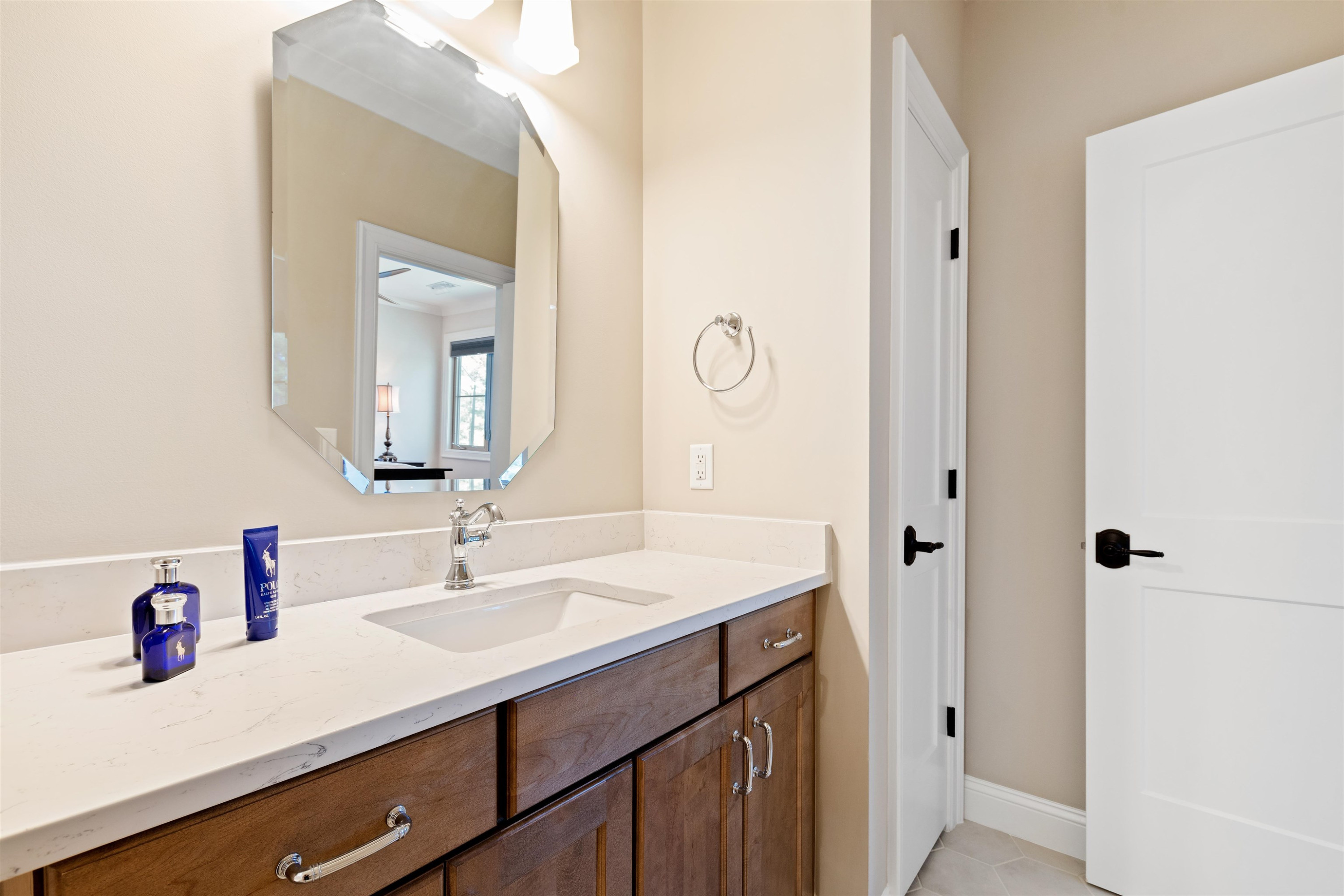 10340 Grafton Road Raleigh, NC 27615 - Photo 48 of 70 a bathroom with a sink and a mirror