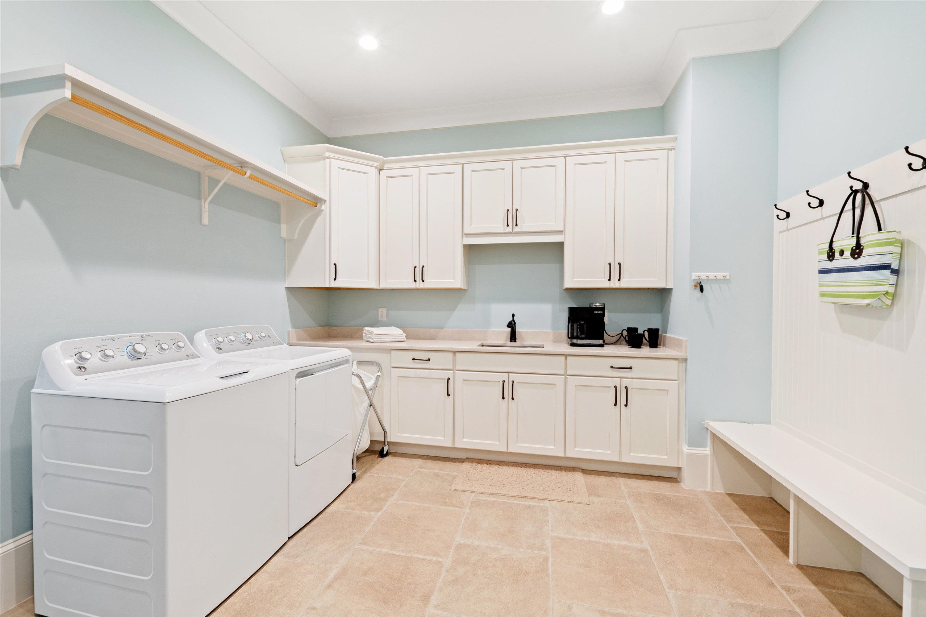 10340 Grafton Road Raleigh, NC 27615 - Photo 53 of 70 a kitchen with cabinets appliances a sink and a counter top space
