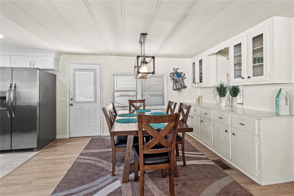 4902 91st Lane North St. Petersburg, FL 33708 - Photo 20 of 41 a view of a dining room with furniture