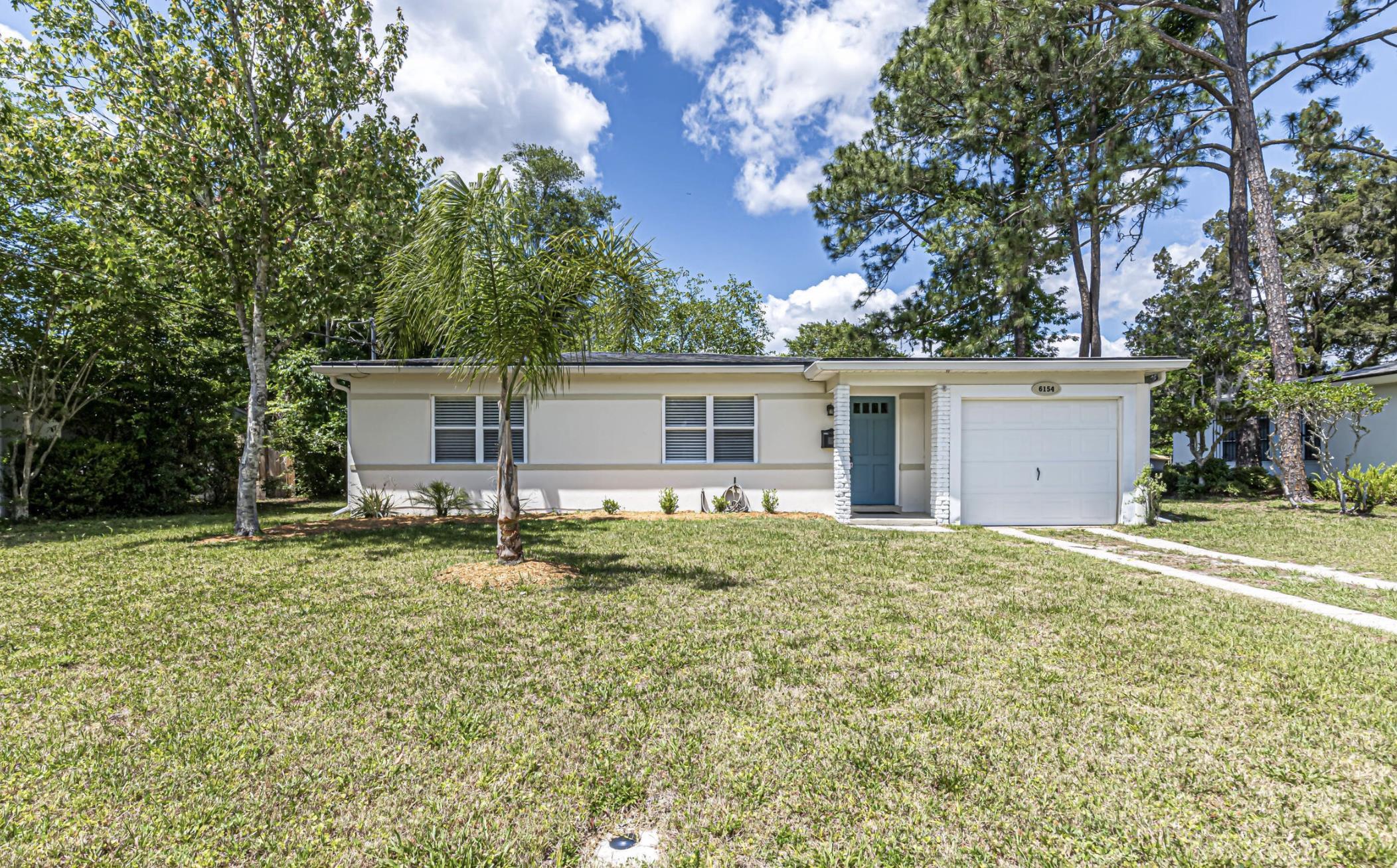 6154 Temple Road Jacksonville, FL 32217 - Photo 3 of 25 front view of a house with a yard