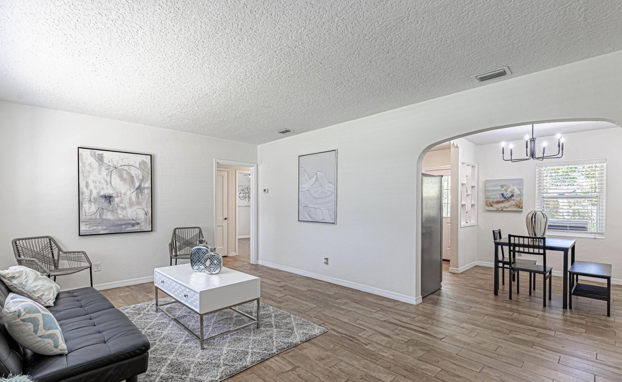 6154 Temple Road Jacksonville, FL 32217 - Photo 7 of 25 a living room with furniture and wooden floor