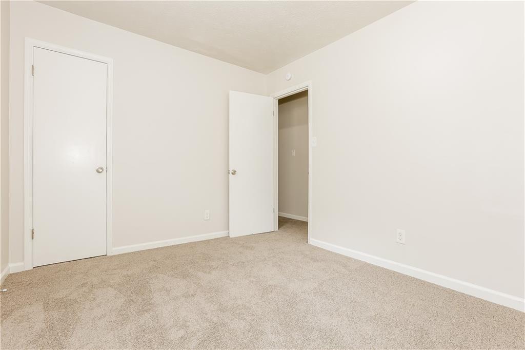 3352 Herrenhut Road Lithonia, GA 30038 - Photo 19 of 27 a view of an empty room