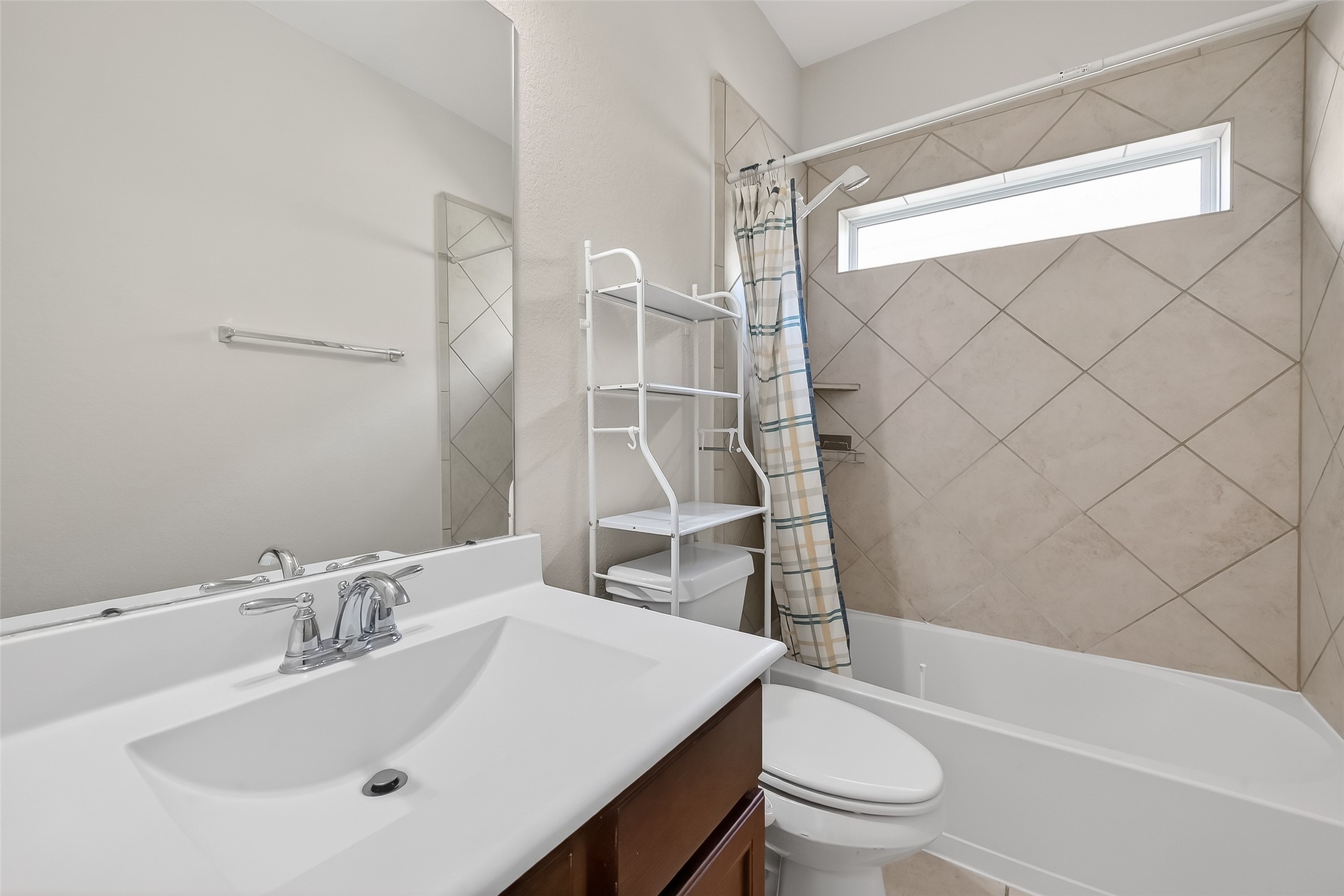 7631 Granite Terrace Lane Houston, TX 77083 - Photo 36 of 46 a bathroom with a sink toilet and shower