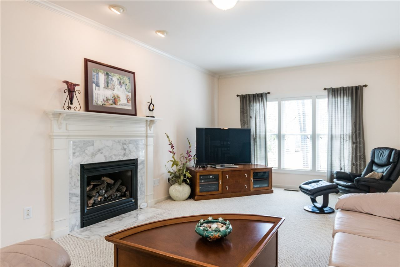 2832 Anfield Road Raleigh, NC 27606 - Photo 5 of 24 Large Family Room with Fireplace is Adjacent to Breakfast Room Family Room