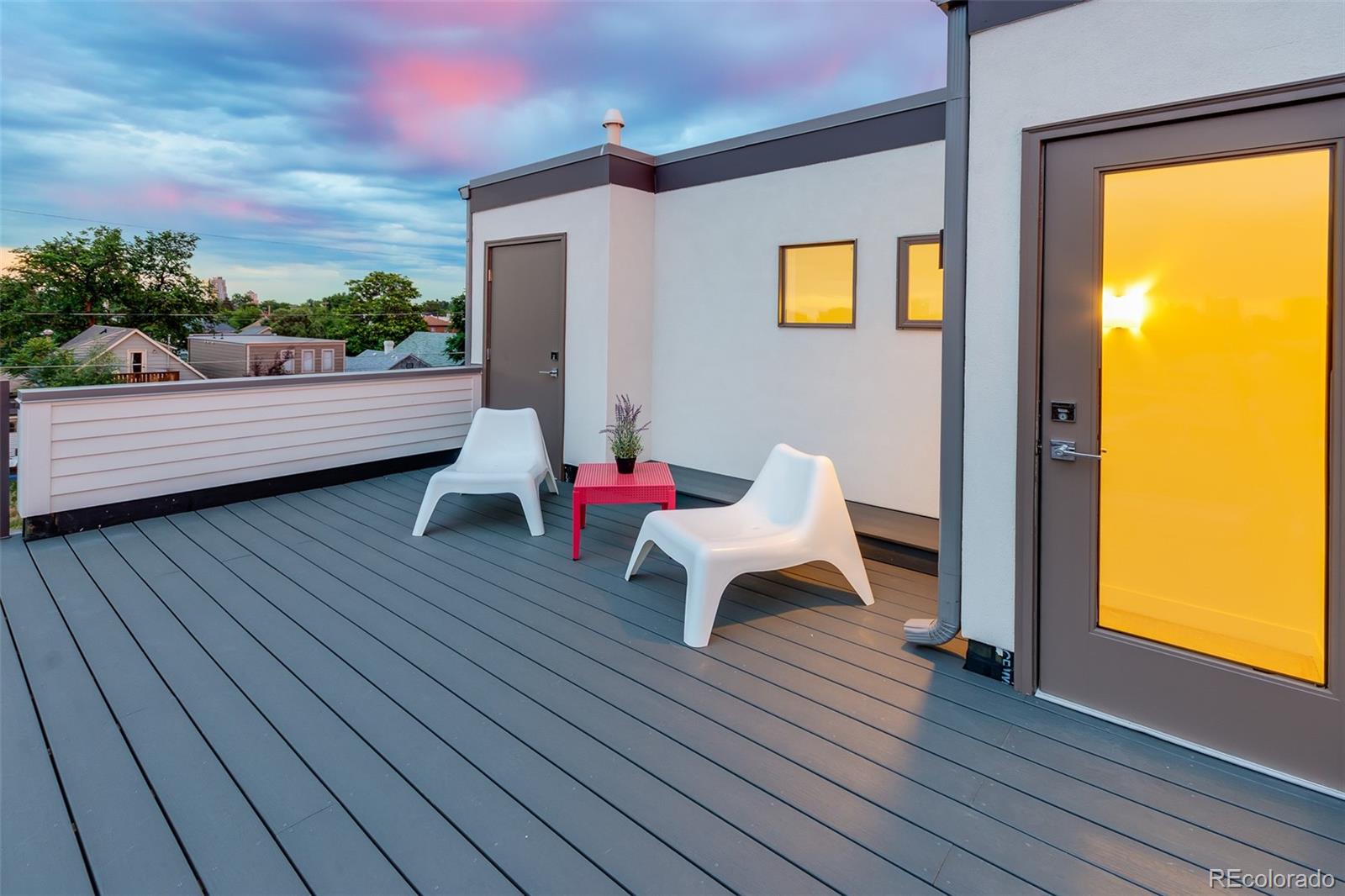 234 Inca Street Denver, CO 80223 - Photo 19 of 27 a living room with furniture and a wooden floor