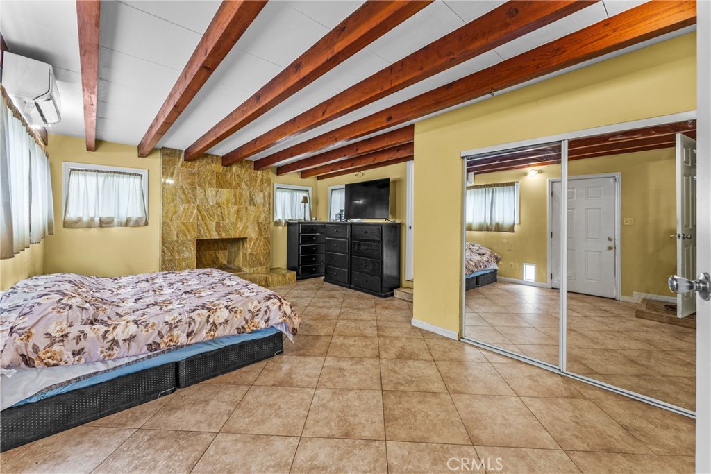 7977 Vista Del Rosa Street Downey, CA 90240 - Photo 15 of 53 a bedroom with a bed and a dresser