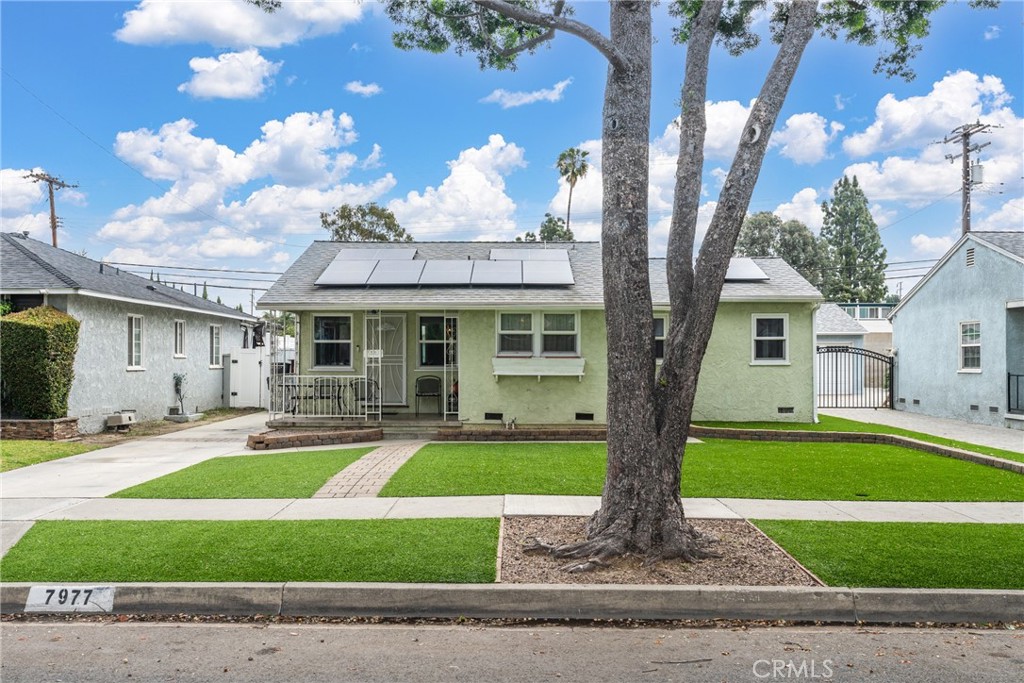 7977 Vista Del Rosa Street Downey, CA 90240 - Photo 2 of 53 a front view of a house with garden