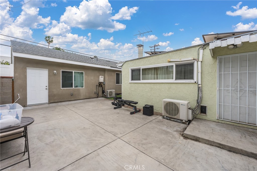 7977 Vista Del Rosa Street Downey, CA 90240 - Photo 25 of 53 a view of a house with patio