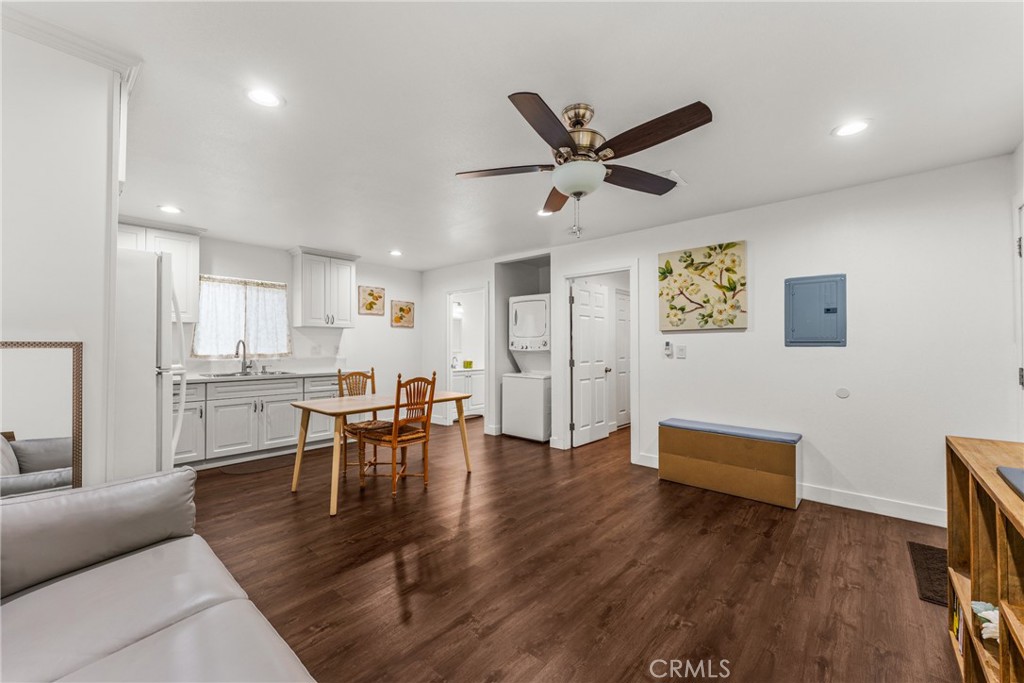 7977 Vista Del Rosa Street Downey, CA 90240 - Photo 34 of 53 a living room with furniture and kitchen view