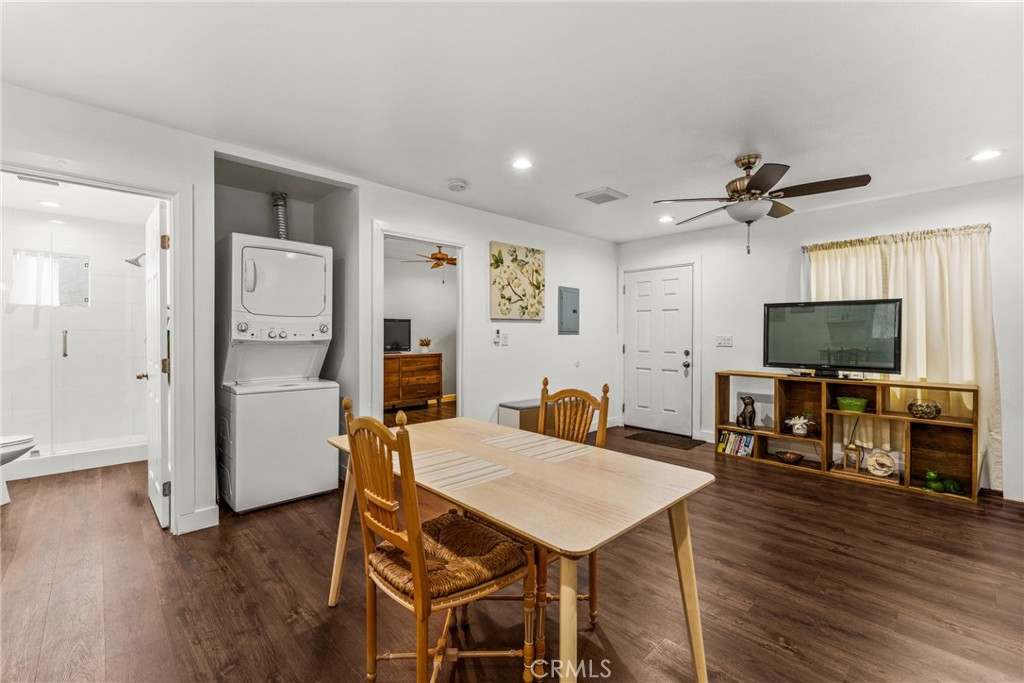 7977 Vista Del Rosa Street Downey, CA 90240 - Photo 36 of 53 a view of a livingroom with furniture and a flat screen tv