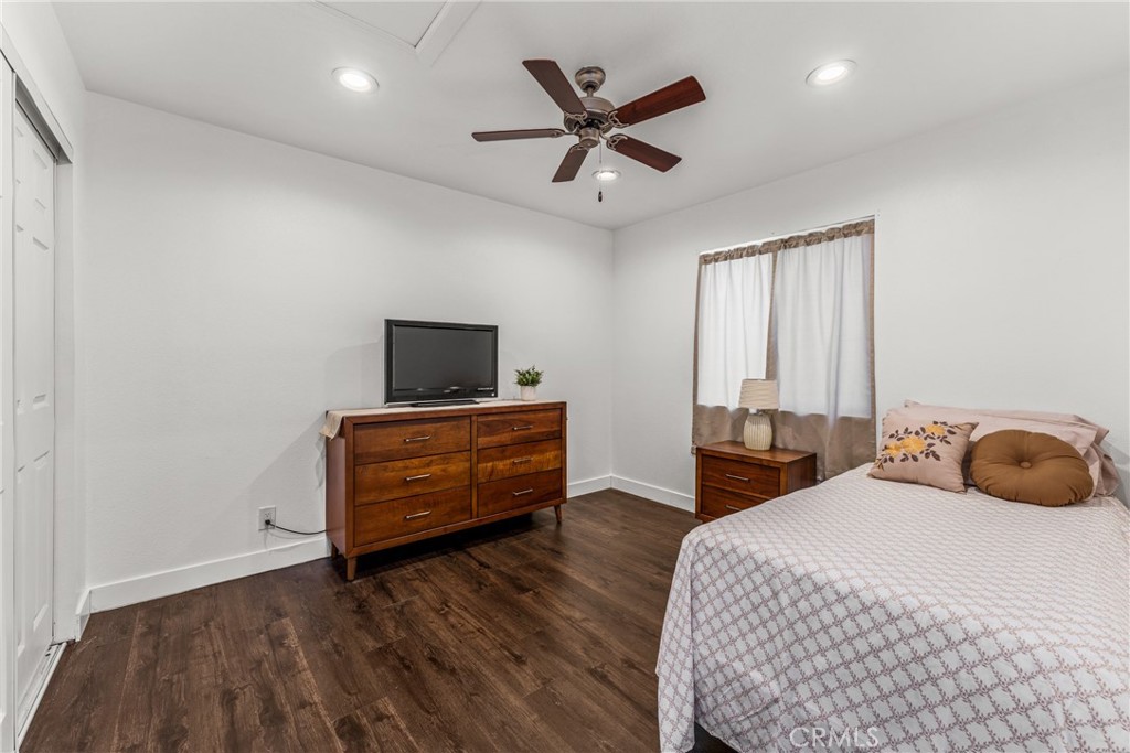7977 Vista Del Rosa Street Downey, CA 90240 - Photo 38 of 53 a bedroom with a bed and a tv on the dresser