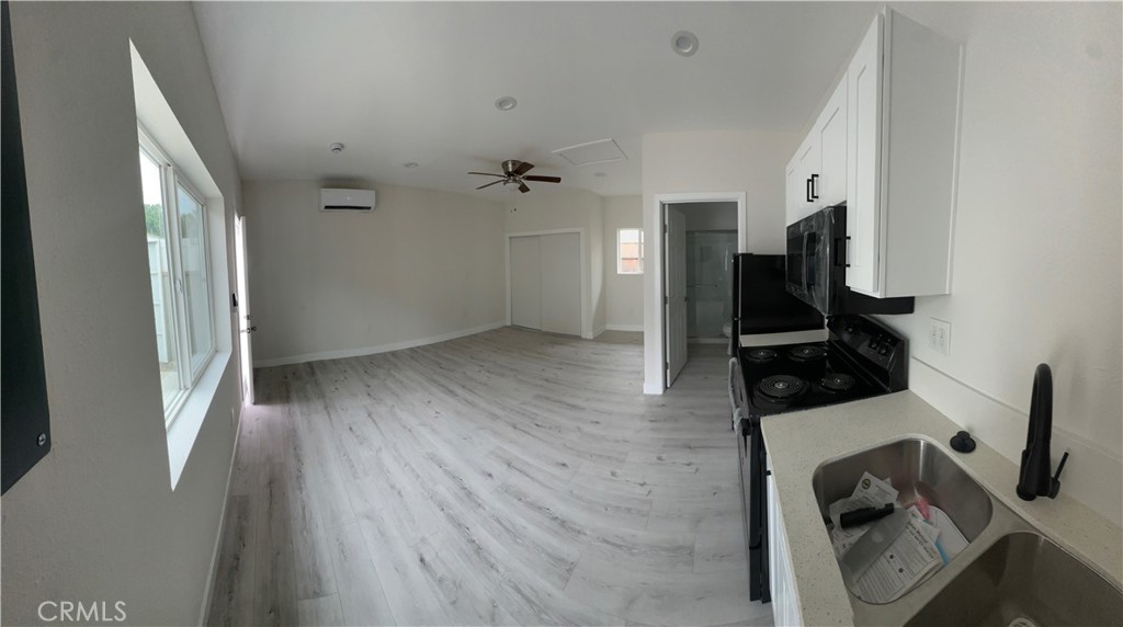 7977 Vista Del Rosa Street Downey, CA 90240 - Photo 46 of 53 wooden floor in an empty room