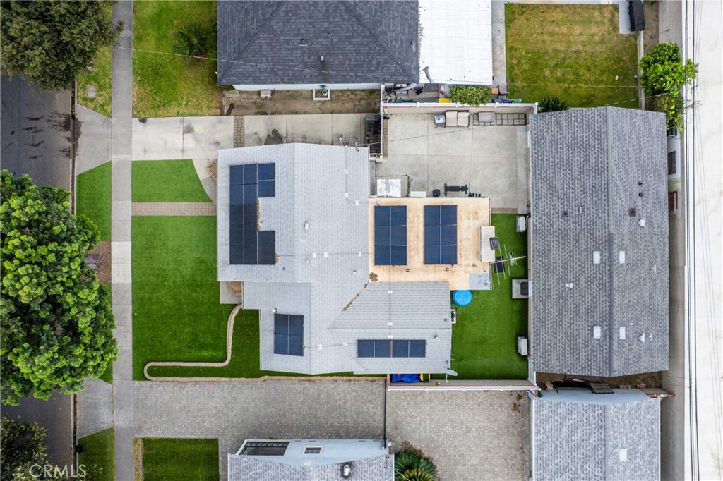 7977 Vista Del Rosa Street Downey, CA 90240 - Photo 53 of 53 an aerial view of a house with a yard and table and chairs