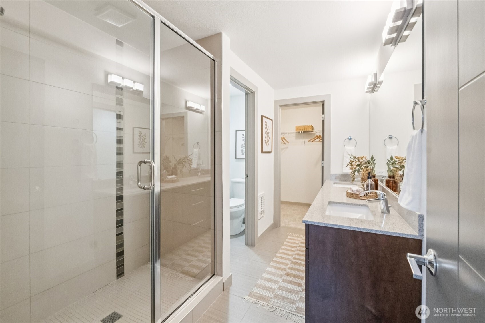 10503 Evanston Avenue North, Unit C Seattle, WA 98133 - Photo 18 of 25 a bathroom with a sink shower and a mirror