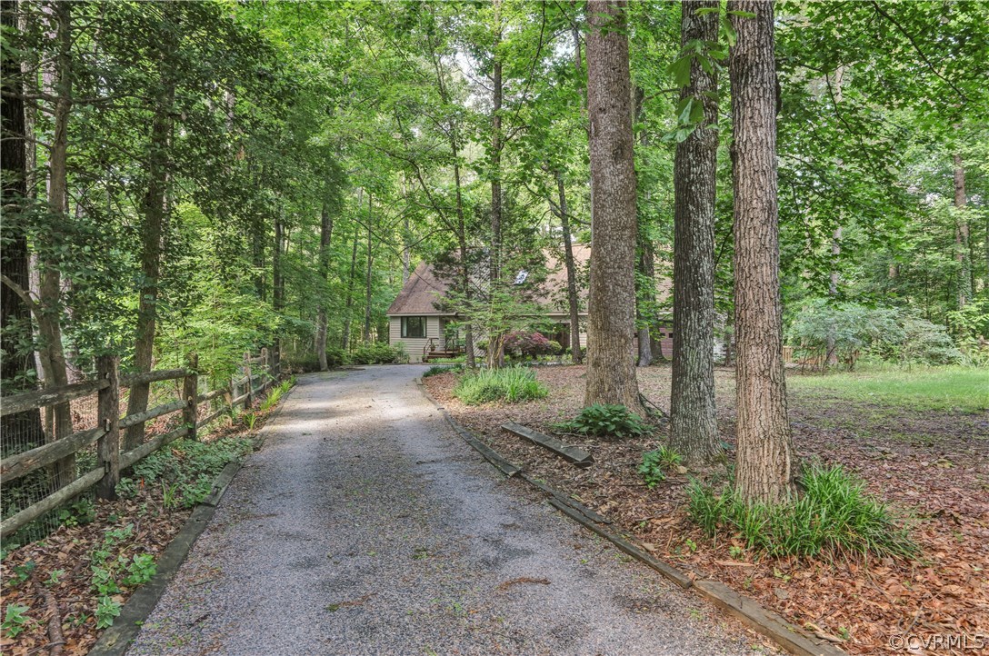 3307 7 Oaks Road Midlothian, VA 23112 - Photo 2 of 33 a view of a forest with trees