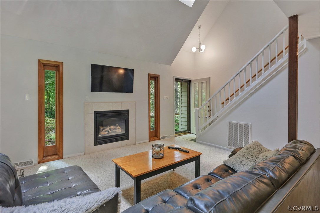 3307 7 Oaks Road Midlothian, VA 23112 - Photo 6 of 33 a living room with furniture and a fireplace