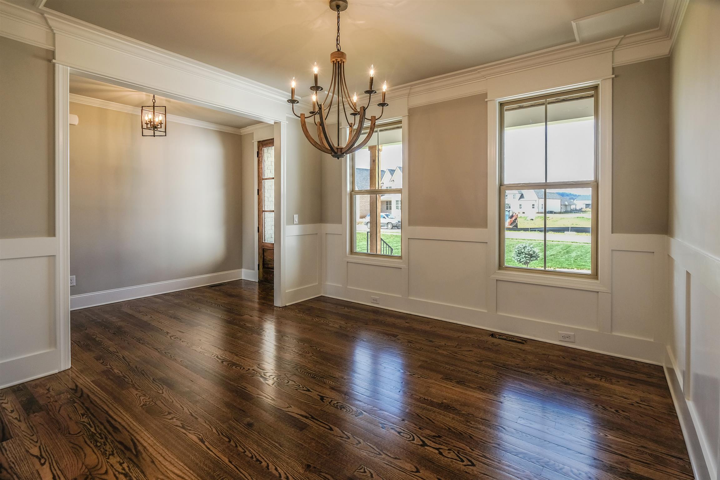2029 Autumn Ridge Way Spring Hill, TN 37174 - Photo 3 of 30 Beautiful dining room with wainscoting and detailed ceiling.