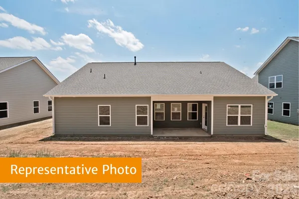 a black and white building with a outdoor space