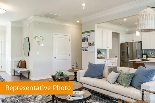 a living room with furniture and a table
