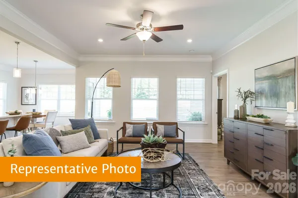 a view of a livingroom with furniture window and outdoor space