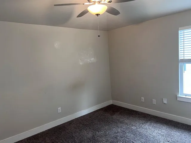 en empty room with a window