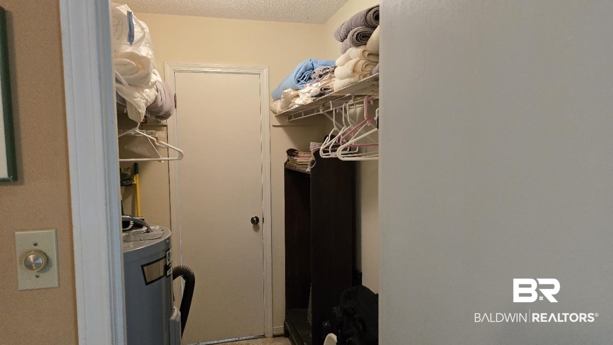 23953 Peturis Road Loxley, AL 36551 - Photo 36 of 56 back door in closet leads to laundry