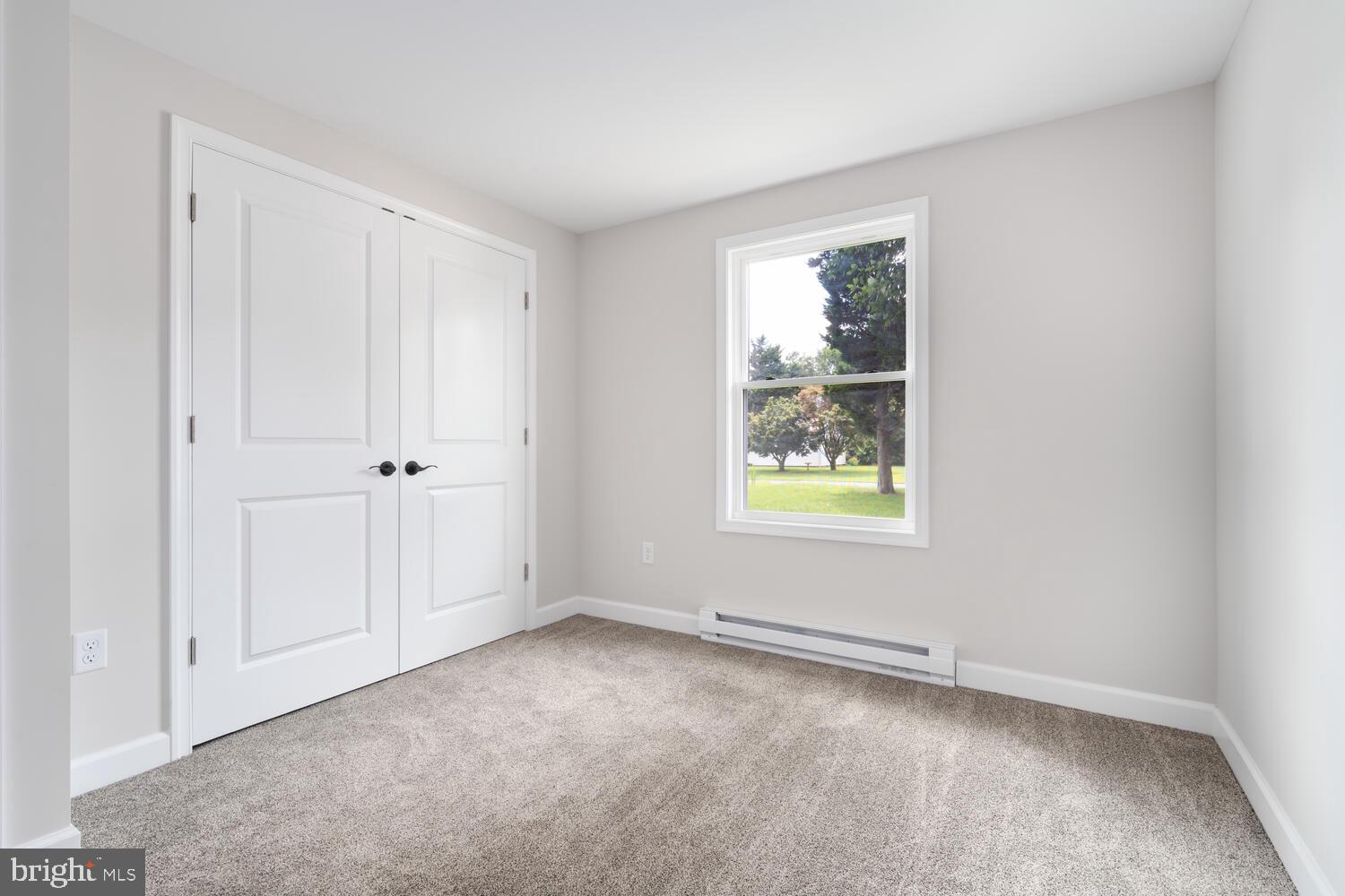 14 North Maple Avenue Ridgely, MD 21660 - Photo 13 of 19 a view of an empty room with a window