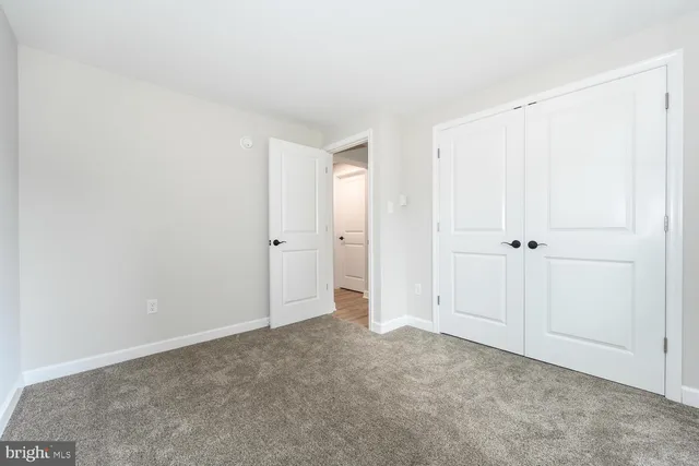 an empty room with closet