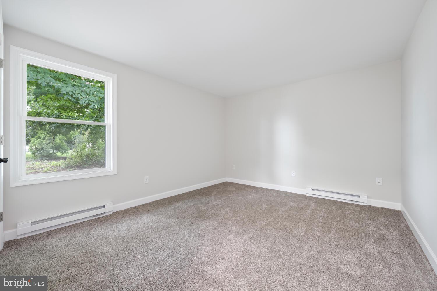 14 North Maple Avenue Ridgely, MD 21660 - Photo 18 of 19 an empty room with a window