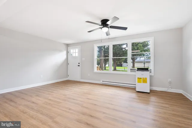 a view of an empty room with window