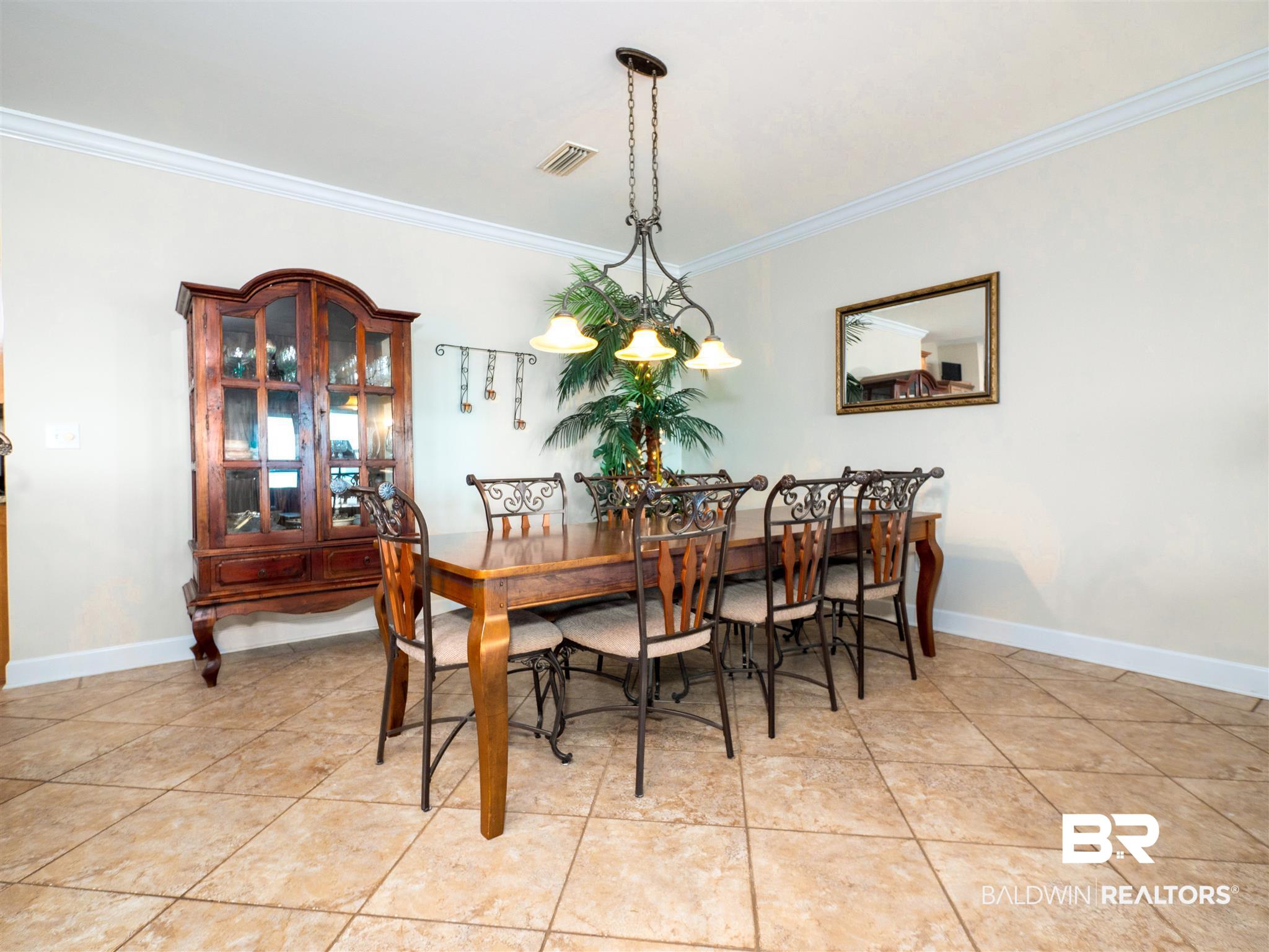 24611 Gulf Bay Road Orange Beach, AL 36561 - Photo 8 of 14 DINING AREA WITH VIEWS