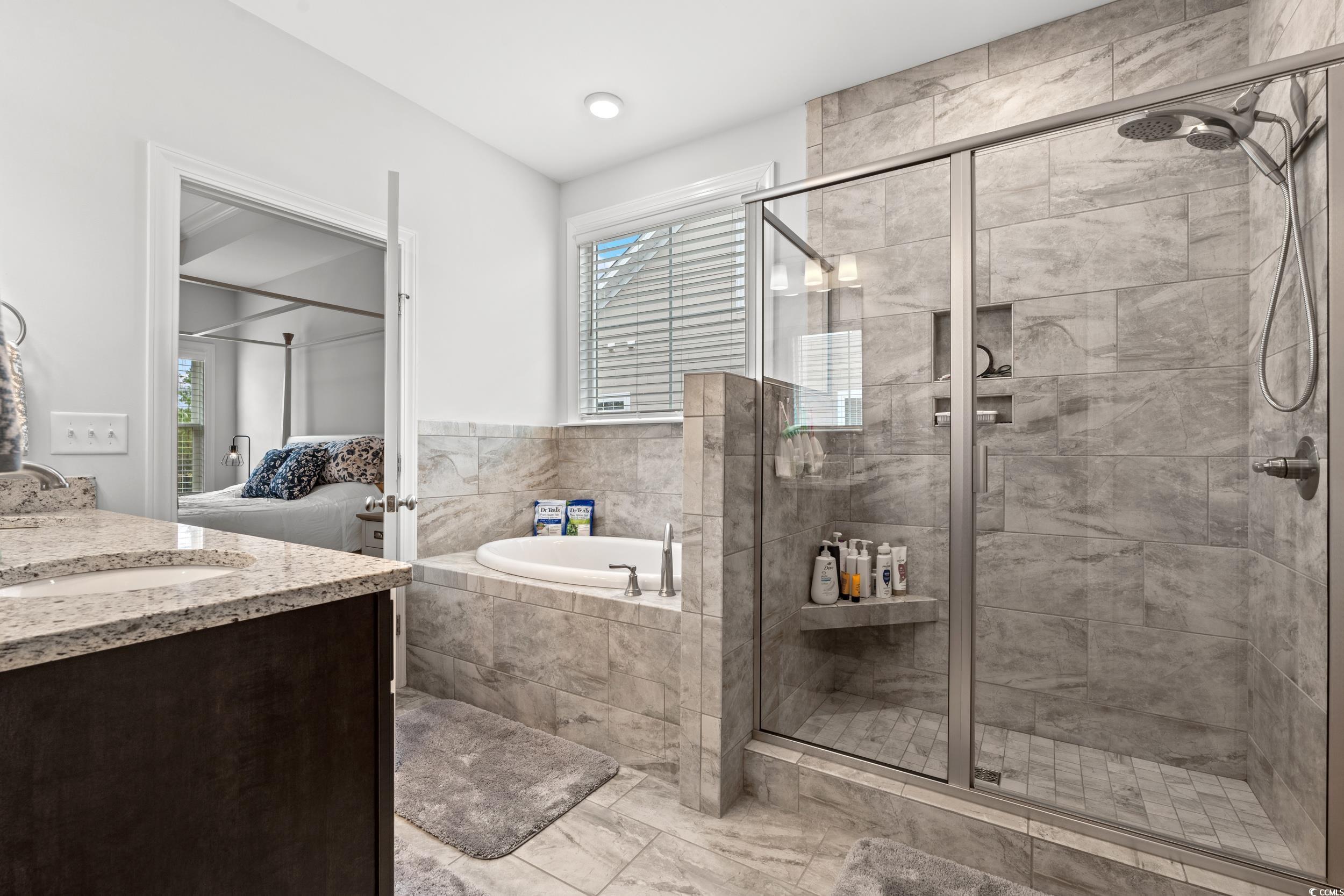 641 Indigo Bay Circle Myrtle Beach, SC 29579 - Photo 16 of 39 Bathroom featuring vanity and separate shower and