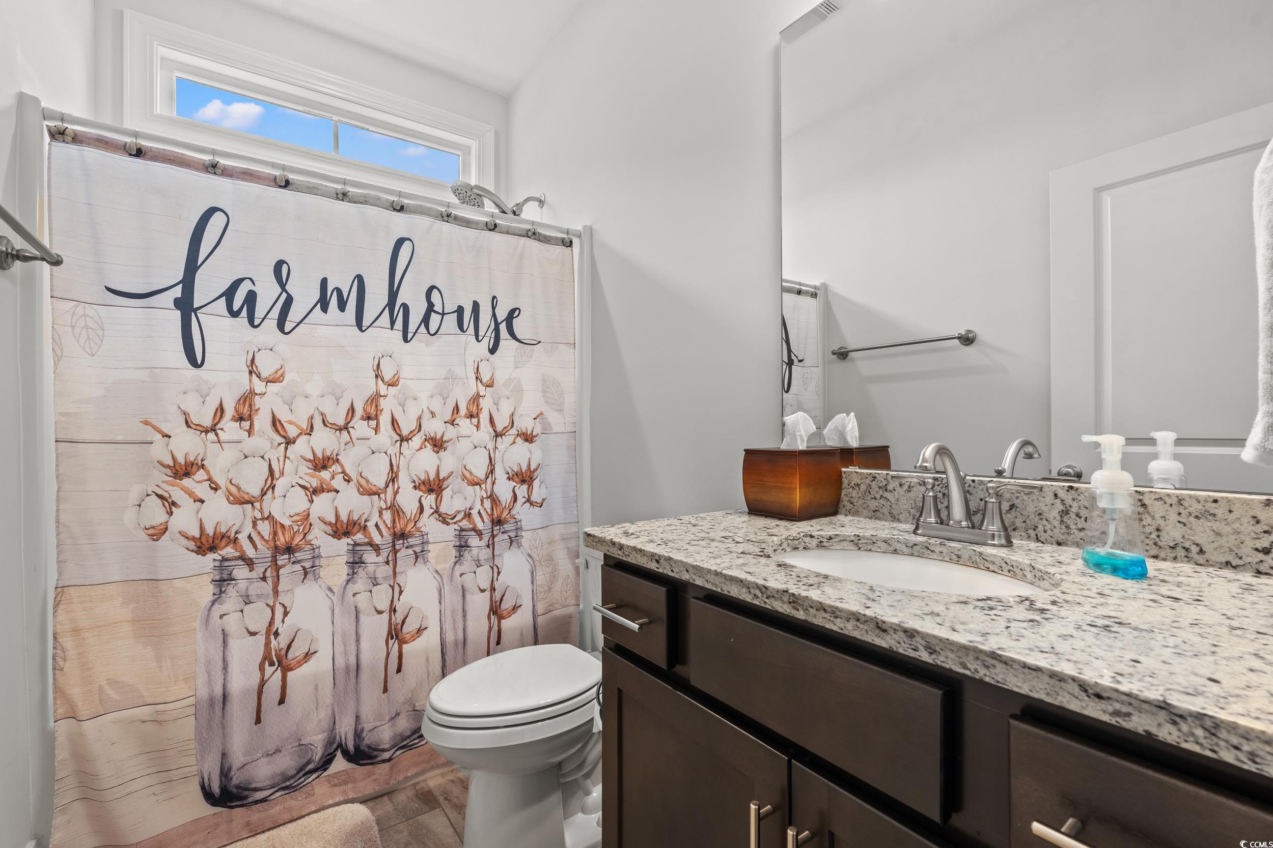 641 Indigo Bay Circle Myrtle Beach, SC 29579 - Photo 21 of 39 Full bathroom with vanity, toilet, and shower / ba